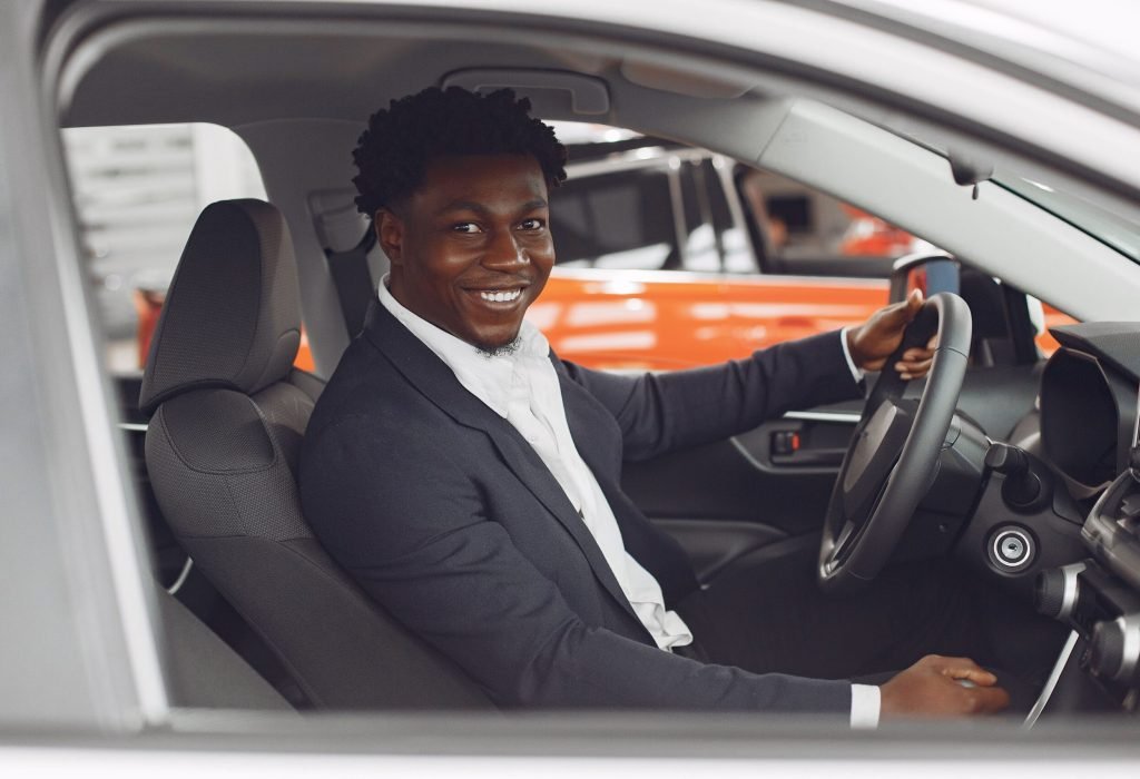 handsome-elegant-man-car-salon-min